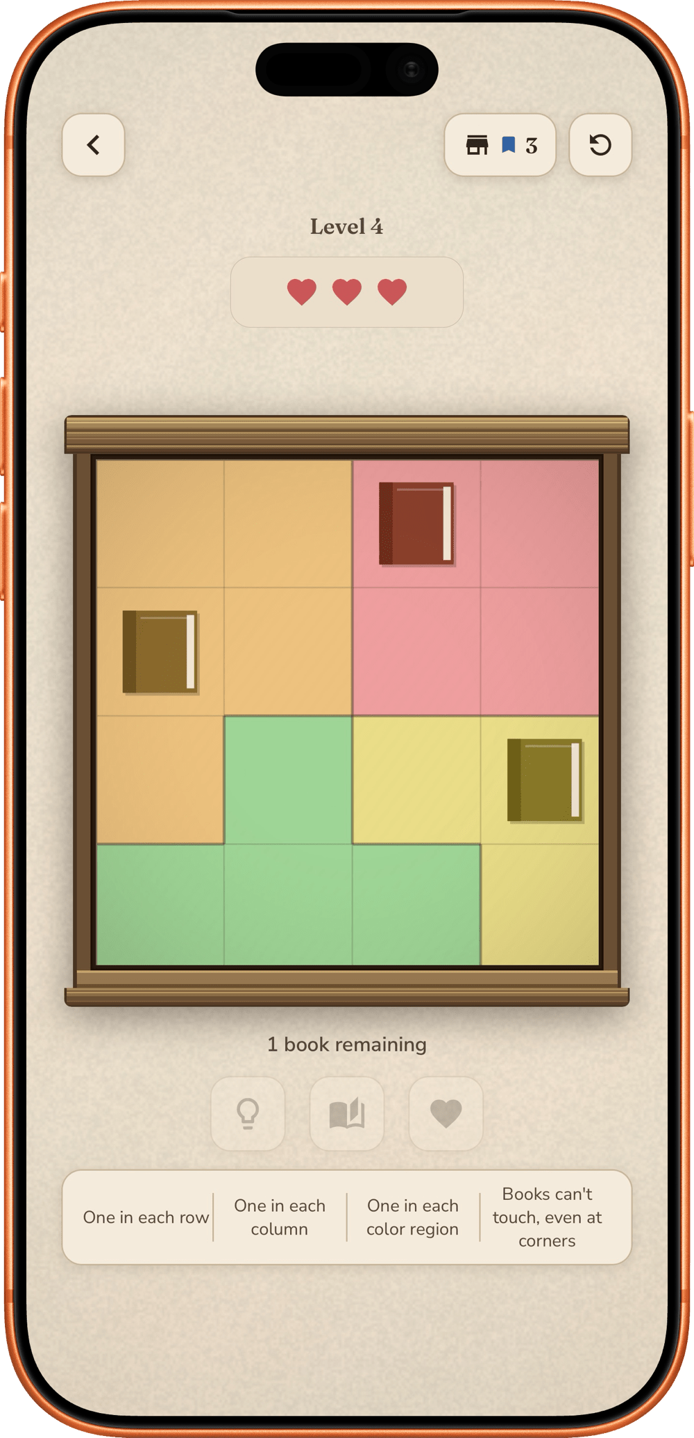 In-progress Lost Books puzzle: a colored-region grid with three books found and one remaining